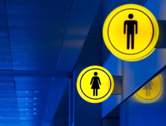 Male, female toilet, restroom sign. Man and woman equality concept. Copy space.