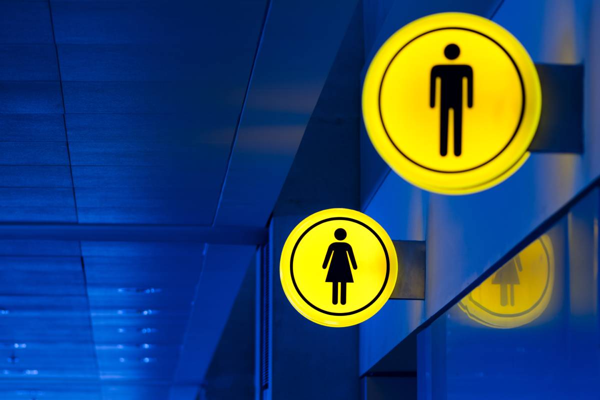 Male, female toilet, restroom sign. Man and woman equality concept. Copy space.